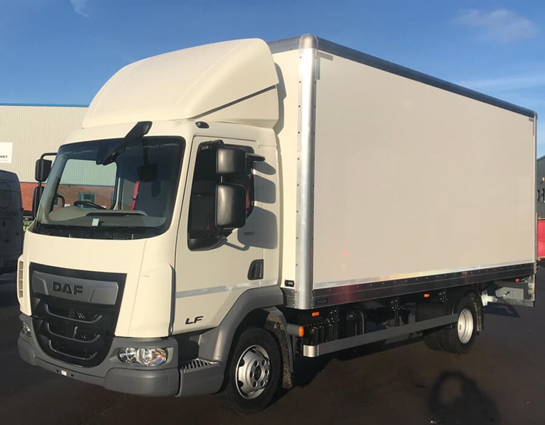 Large, white 7 tonne DAF truck parked in a United Rental Licensee’s forecourt.